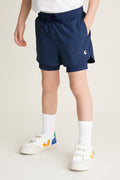 Before Sunrise Blue Cardio Short: classic athletic shorts with elastic drawstring waist, visible liners, and pockets. Paired with white socks and sneakers for an effortless, fun, high-end look.