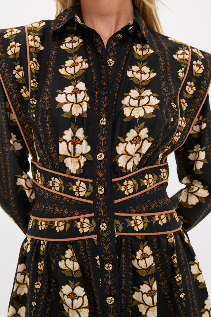 Black Embroidered Flowers Topstitching Long Sleeve Mini Dress with a classic floral print, effortless waist-cinching tan piping, and fun statement shoulders, offering a high-end, chic look.