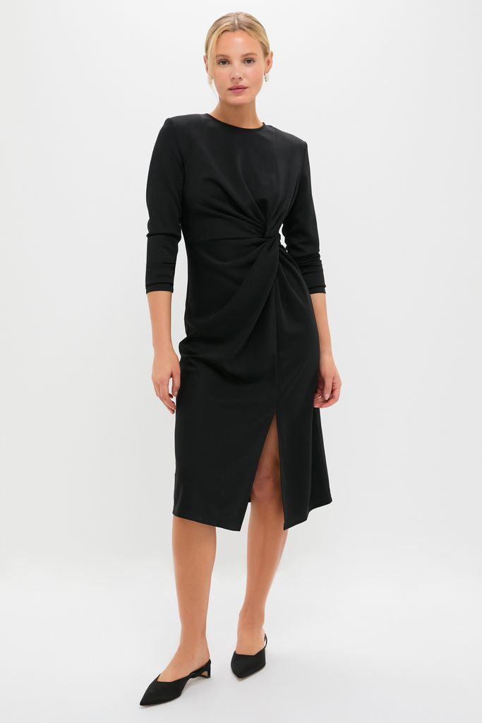Classic Black Jersey Knit Wilbanks Midi Dress with twist detail and front slit, featuring three-quarter sleeves and shoulder pads for an effortless, high-end look.