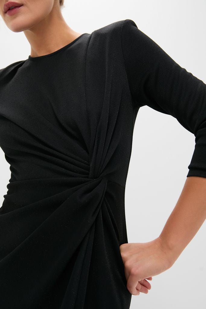 Black Jersey Knit Wilbanks Midi Dress with classic twist detailing at the waist, featuring structured shoulder pads and three-quarter sleeves for an effortless, high-end look.
