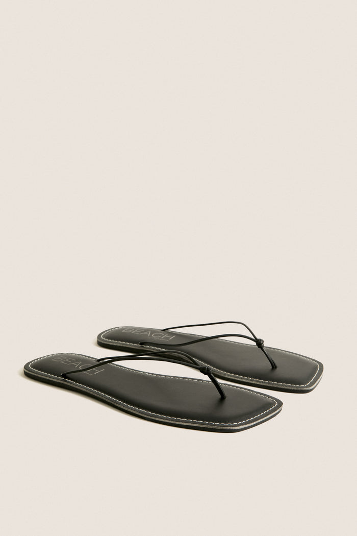 Black Ray Flip Flops