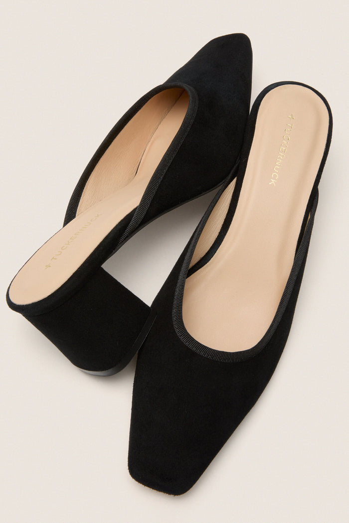 Black Suede Tilda Mules with an effortless mule silhouette, classic pointed-toe, and comfortable block heel, offering high-end European craftsmanship for a fun, versatile look.