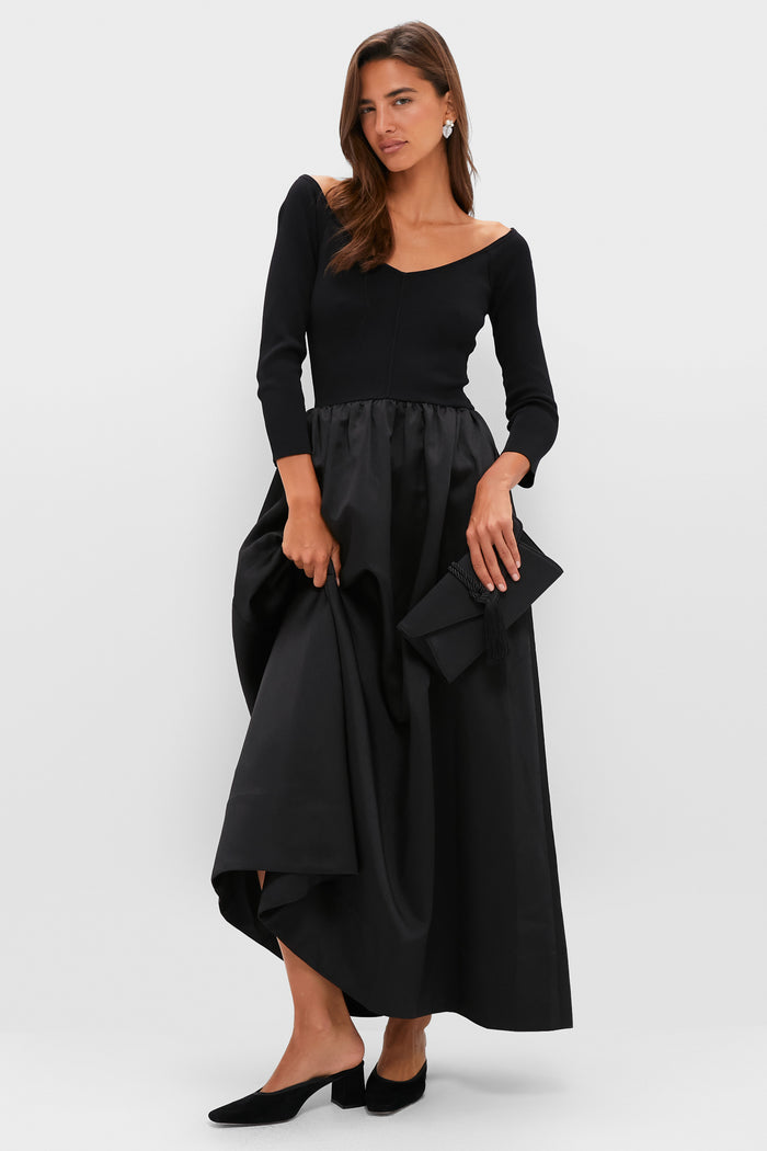 Classic Black Suede Tilda Mules with a mule silhouette and block heel, effortlessly styled for a high-end look, perfect for any formal or fun occasion.