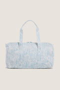 Blue Bunny Toile Weekender Duffel Bag, a classic, fun, and effortless travel tote with detachable strap, water-resistant finish, and interior mesh pocket, perfect for high-end getaways.