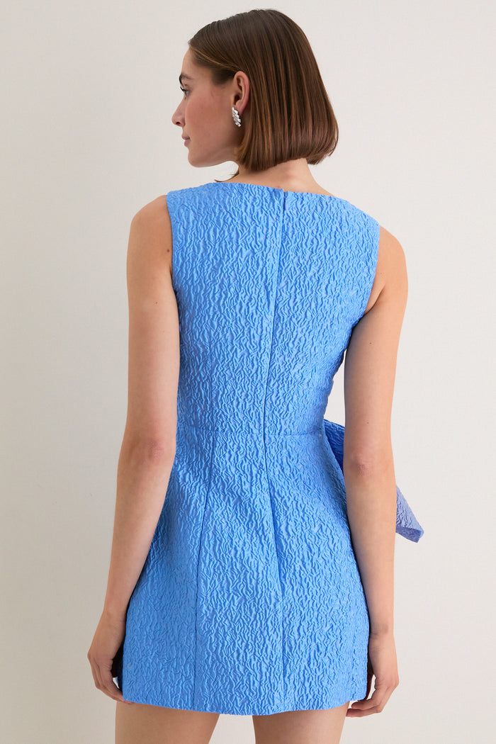Blue Jacquard Briallen Bow Mini Dress features a classic, sleeveless design with an oversized bow, offering an effortless, high-end look for fun, elevated occasions.