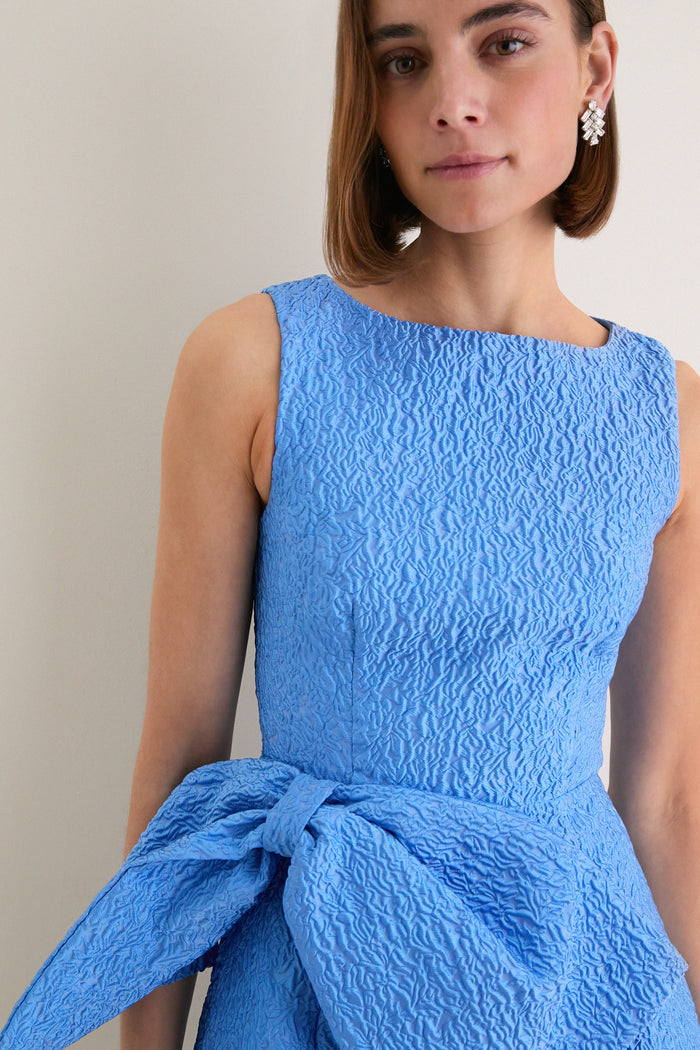 Blue Jacquard Briallen Bow Mini Dress with a classic boat neckline and oversized bow, offering an effortless, high-end look for fun, elevated occasions.