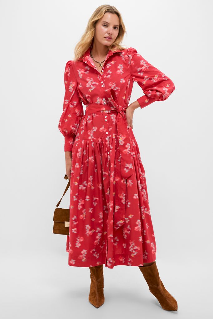 Model in a classic, effortless red floral shirt-dress, accessorized with a Blue Orion Necklace, exuding a fun and high-end vibe with suede bag and boots.