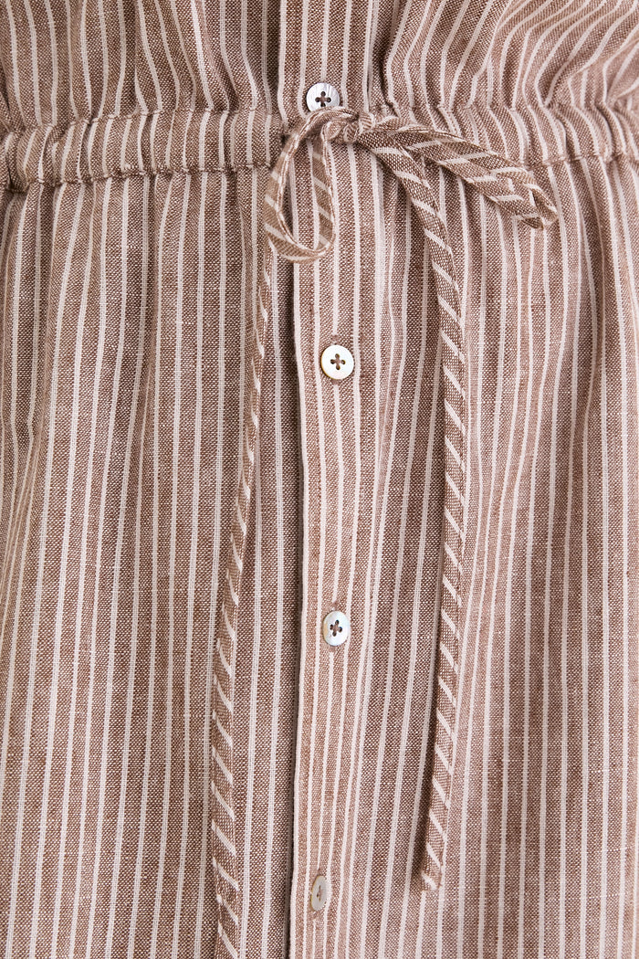 Close-up of Cafe Stripe Linen Julien Shirt Dress, showcasing its classic, high-end design with gathered waistband, button front, and effortless drawstring bow detail.