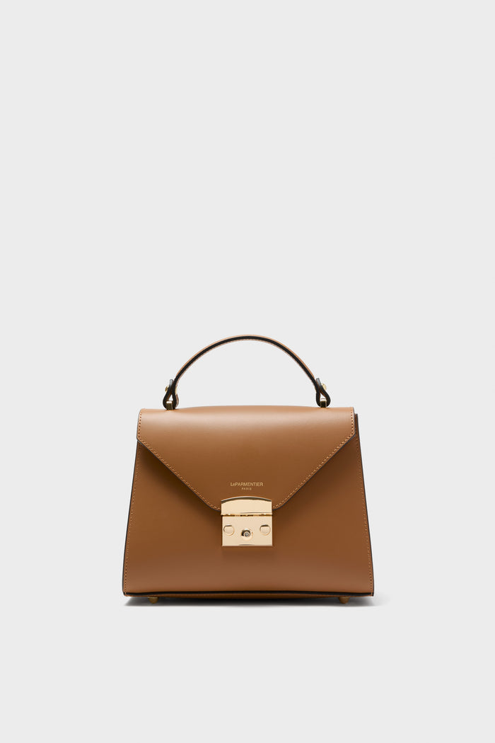 Caramel Peggy Top Handle Satchel Bag in tan leather with gold-tone hardware, offering a classic, high-end look. Features include a detachable strap and multiple pockets.