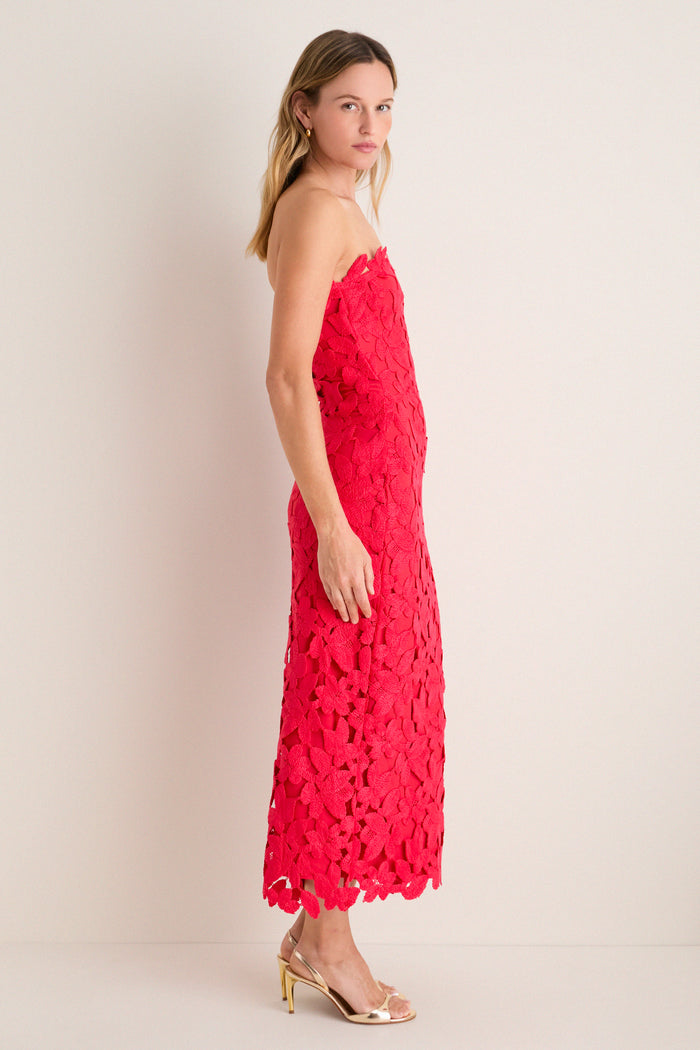 Classic and effortless, the Cherry Red Philomena Midi Dress in floral lace exudes high-end fun, paired with metallic gold sandals and hoop earrings.