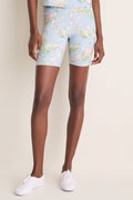 Classic and effortless Clubhouse Chintz Compression Spandex Mac Bike Short in a delicate floral print, perfectly paired with white sneakers for a fun, high-end athleisure look.