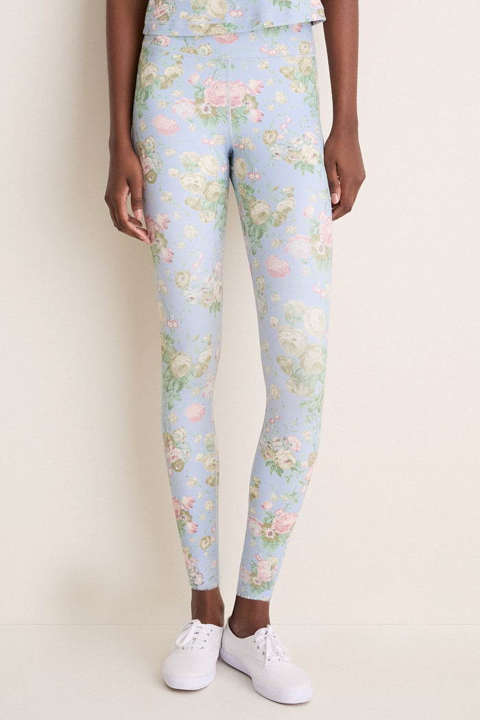 Classic Clubhouse Chintz High Rise Compression Spandex MacKenzie Legging, showcasing effortless vintage floral print style, paired with white sneakers for a fun, high-end look.