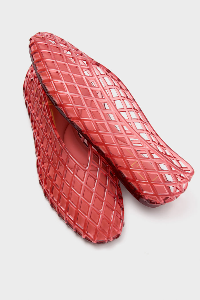Coral Jam Jellys: Classic, effortless women’s flats featuring a fun, high-end geometric lattice design in translucent PVC, perfect for an easy yet stylish look.