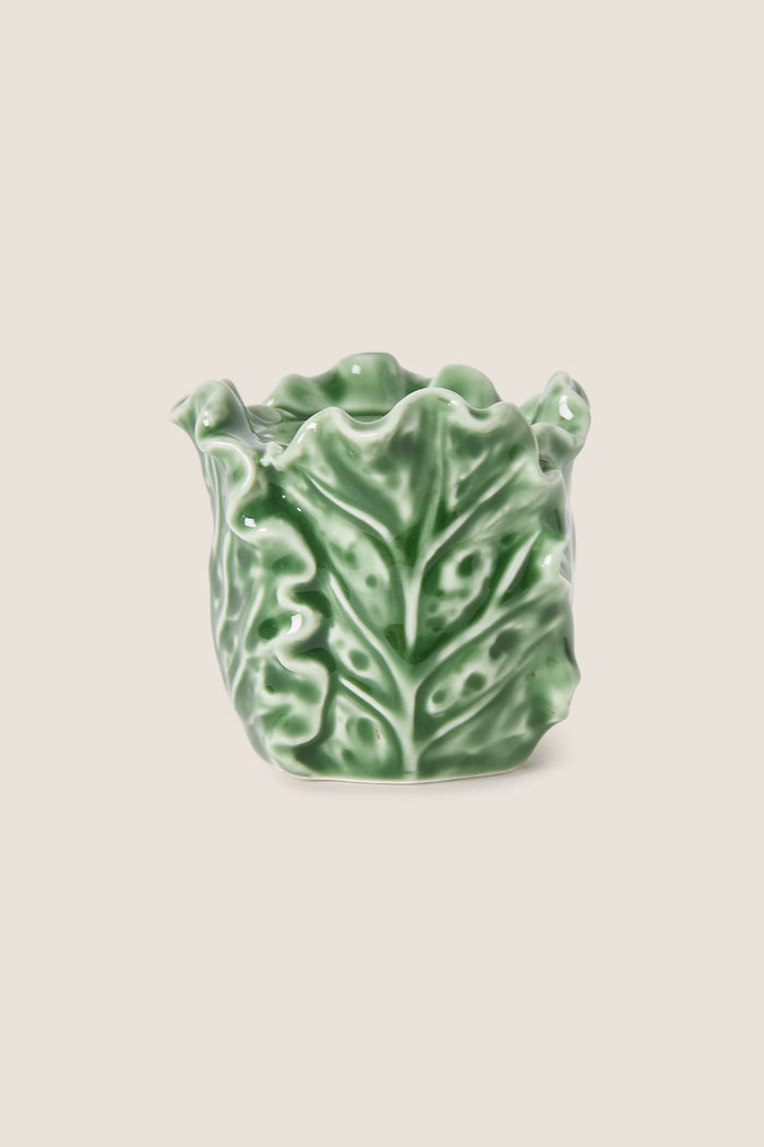 Cruciferous Leaf Taper Candleholder: classic stoneware design mimicking ruffled leaves, effortlessly adding high-end, fun elegance to any table setting or special occasion.