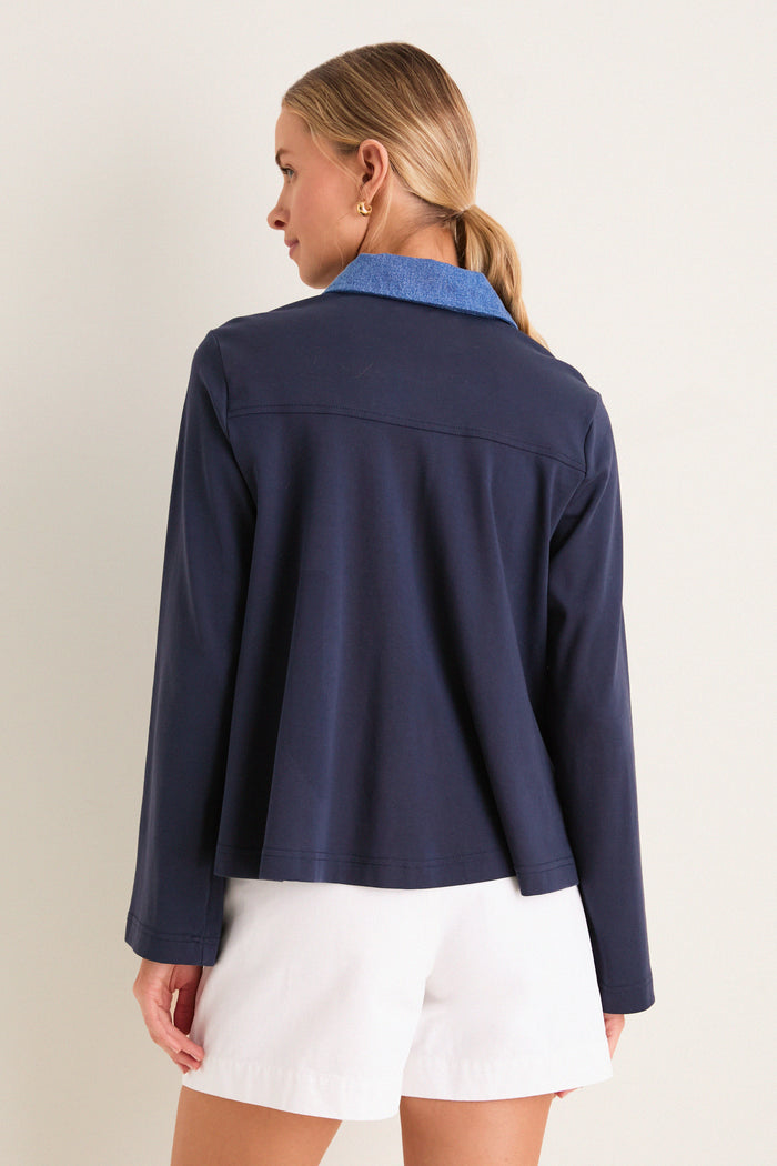 Denim Collar Carlyn Long Sleeve Polo, a classic yet fun piece with a chic navy design and contrasting collar, offers effortless style and high-end versatility.
