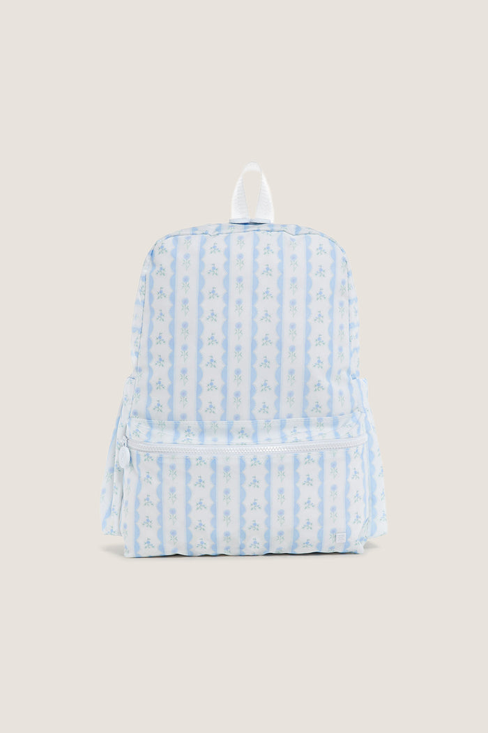 Floral Blue Ribbon Backpack featuring classic light-blue scalloped stripes and tiny floral sprigs, with an effortless front zip pocket and fun white carry-loop for high-end style.