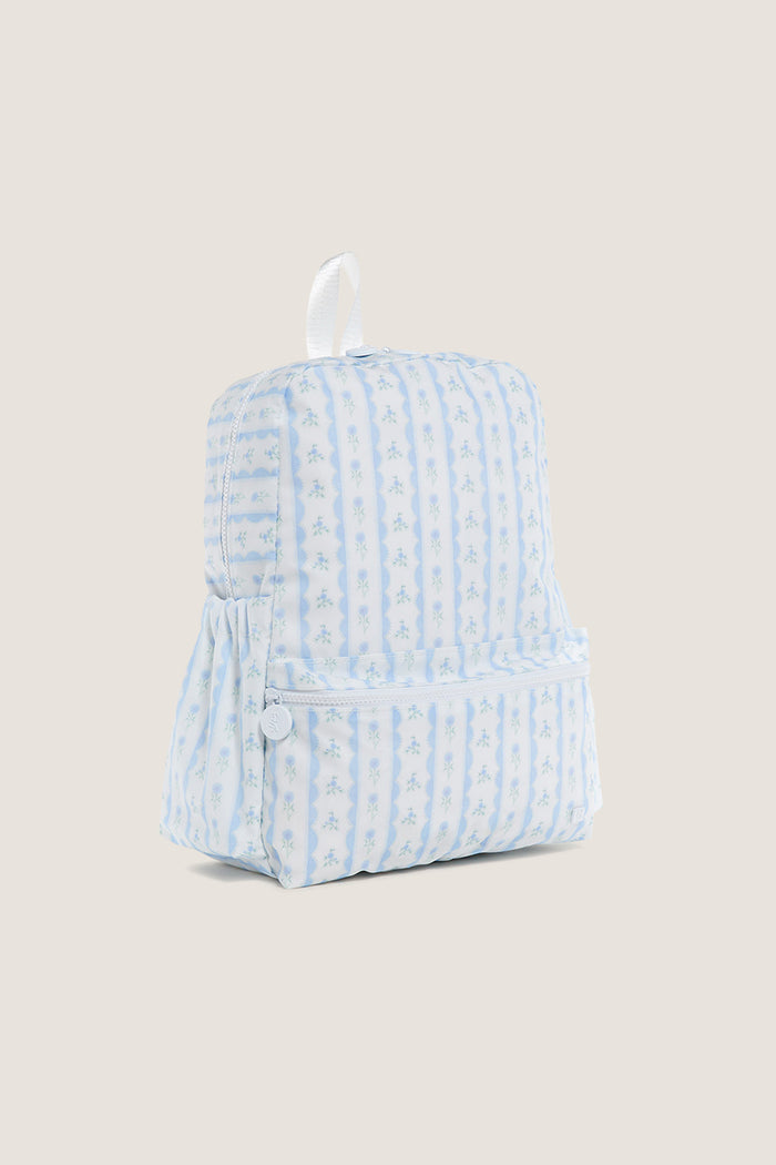 Floral Blue Ribbon Backpack with classic pale blue and white stripes, featuring tiny floral motifs, front zippered pocket, and elastic side pocket for an effortless, high-end look.