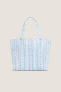 Floral Blue Ribbon Jumbo Tote features classic blue-and-white stripes with floral motifs, offering an effortless, high-end touch to your fun, everyday carry-all needs.