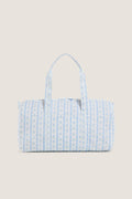 Floral Blue Ribbon Weekender Duffel Bag with classic blue and white stripes, tiny floral motifs, and effortless two-way zipper, exudes fun and high-end practicality.