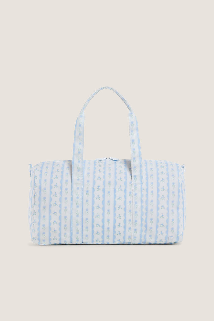 Floral Blue Ribbon Weekender Duffel Bag with classic blue and white stripes, tiny floral motifs, and effortless two-way zipper, exudes fun and high-end practicality.