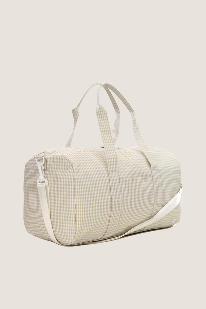 Gingham Pearl Grey Weekender Duffel Bag, featuring classic beige-and-white gingham, detachable strap, and two-way zipper. Effortless, high-end design for fun, spontaneous travels.