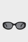Gloss Black Lyna Sunglasses, oval-shaped acetate frames with dark lenses, offer a classic yet bold look. Effortlessly fun and high-end, perfect for confident, stylish wear.