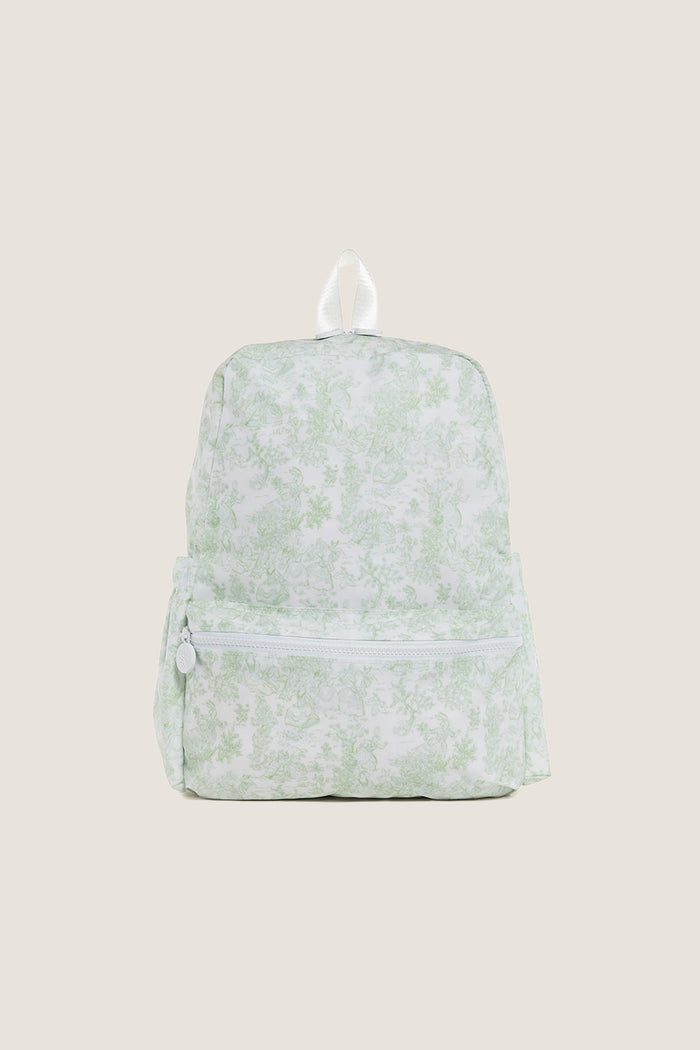 Green Bunny Toile Backpack with a classic toile-style pattern, featuring an effortless, fun design with a small zippered front pocket and white accents, perfect for high-end everyday use.