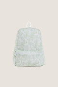 Green Bunny Toile Backpack with a classic toile-style pattern, featuring an effortless, fun design with a small zippered front pocket and white accents, perfect for high-end everyday use.