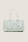 Green Bunny Toile Weekender Duffel Bag with classic toile print, twin handles, and a detachable strap; designed for effortless, fun travel with high-end practicality.