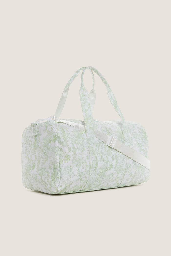 Green Bunny Toile Weekender Duffel Bag: Classic, fun duffel featuring a pastoral pattern, detachable strap, and two-way zipper. Effortlessly high-end and perfect for travel adventures.