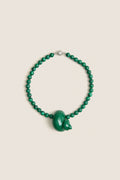 Green Mykonos Necklace: Classic malachite beads with an enamel animal-shaped pendant, silver clasp. Effortless, high-end design for fun, stylish outings.