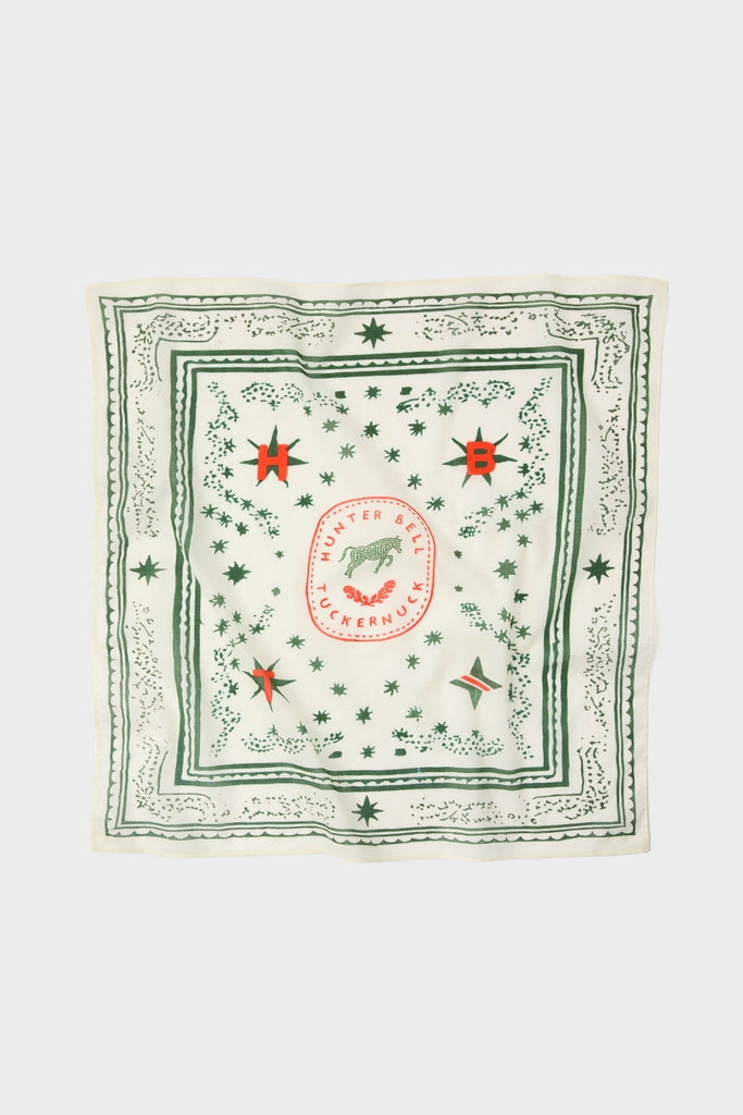 HB x Tuckernuck Stars at Night Scarf, featuring classic green stars and red starbursts, adds effortless flair and fun to any high-end wardrobe.
