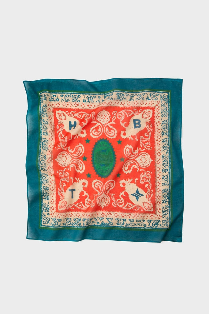 HB x Tuckernuck Texas Strong Scarf, a classic, high-end bandana with stylized turtle motifs and geometric patterns, effortlessly blending fun and elegance.
