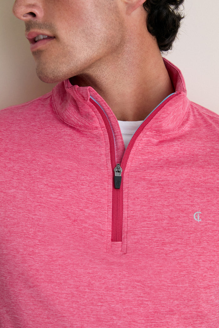 Man wearing Heathered Red Featherweight Performance Pullover, showcasing its classic quarter-zip design and effortless style, ideal for high-end, fun outings.