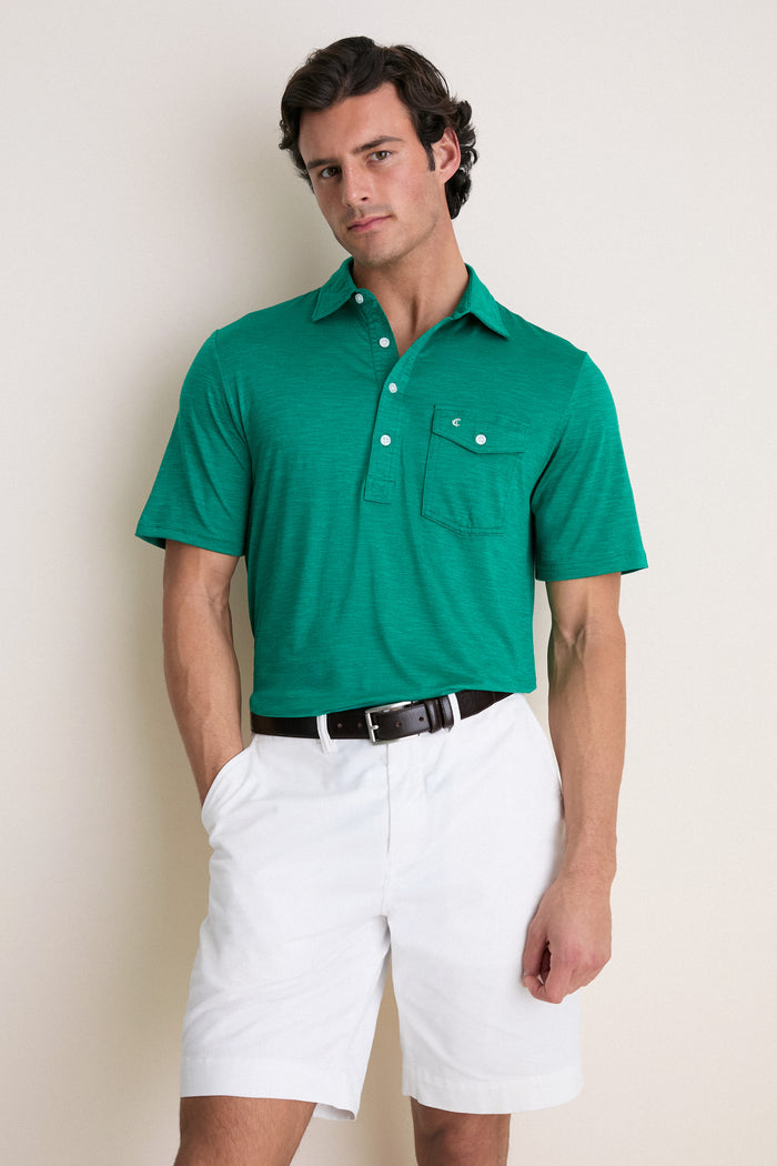 Male model wearing the classic Home Turf Performance Sport Players Shirt, showcasing its effortless style with short sleeves, a 4-button placket, and chest pocket.