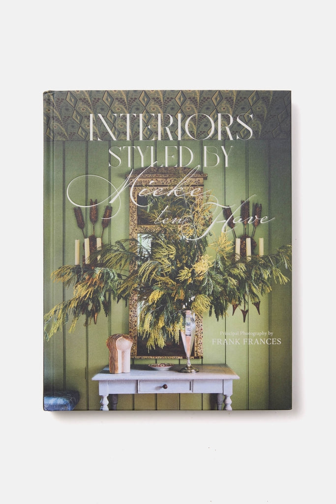Hardcover book titled Interiors: Styled by Mieke Ten Hav featuring a classic styled interior. Perfect for adding a touch of effortless, high-end elegance to your coffee table.