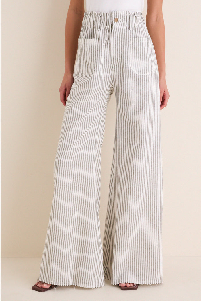 Juniper Stripe Linen Tulip Wide Leg Pant with classic wide-leg silhouette and effortless, high-end design featuring a paper-bag waist and patch pockets, perfect for fun, warm-weather outings.