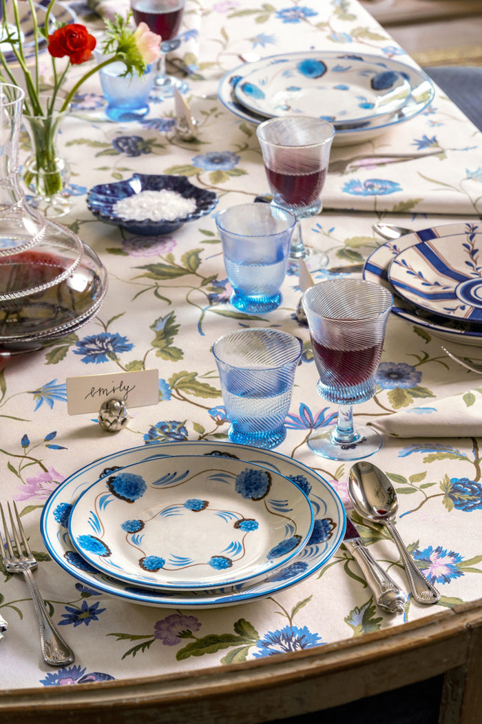 Light Blue Spiral Wine Glasses (Set of 4) add a classic, high-end touch to an effortlessly elegant tablescape, showcasing fun, mouth-blown patterns and vintage charm.