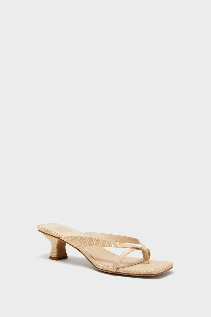 Light Natural Brevel Heels: A classic, effortless women’s heeled sandal with a thong strap and textured finish, offering a fun, high-end look with a flared block heel.