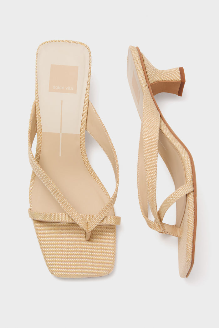 Light Natural Brevel Heels: classic women’s strappy sandals with a square-toe, effortless woven material, and low block heel, perfect for a fun, high-end look.