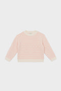 A light pink knit Pink Heart Sweater with a textured diamond pattern and cream ribbed trim from Bonton—perfect for kids’ wardrobes.