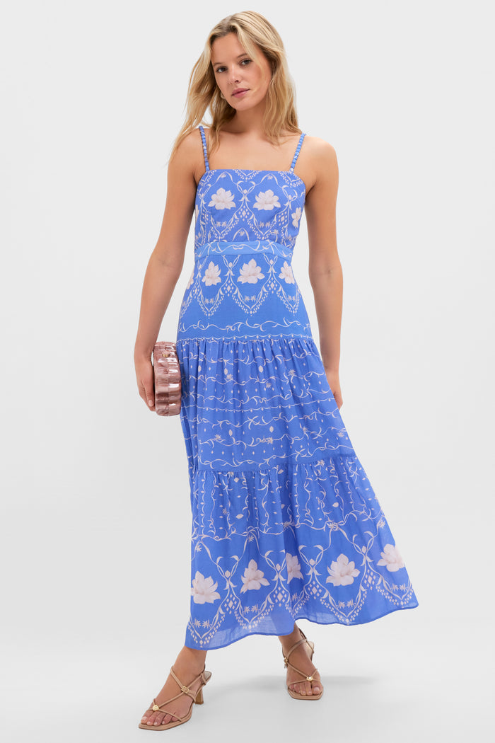 Young woman in a periwinkle-blue maxi dress showcases classic, fun, and high-end Light Tan Mylee Heels, embodying effortless elegance and confidence.