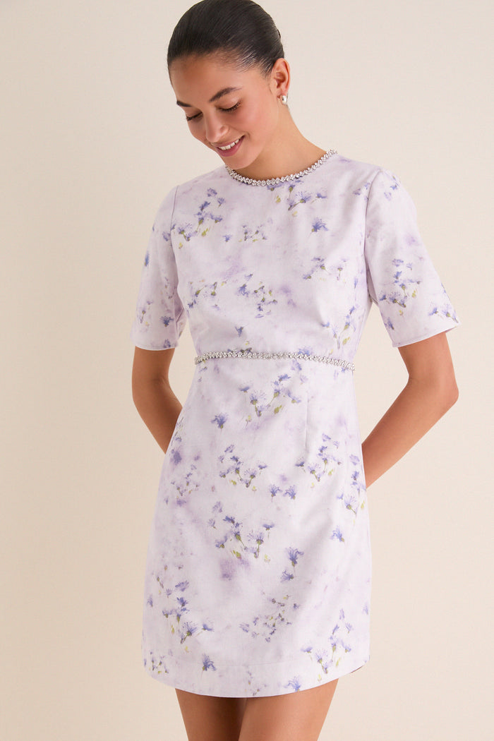 Effortlessly classic Lilac Floral Crystal Embellished Floria Mini Dress with fun floral print and high-end sparkle, perfect for elevated daytime events.