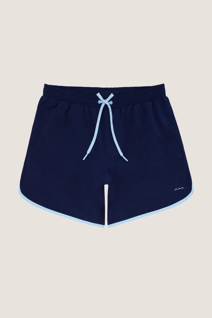 Navy Boardie: Classic navy shorts with light-blue trim and drawstring, featuring a wave logo, offering an effortless, fun, and high-end look for water activities.