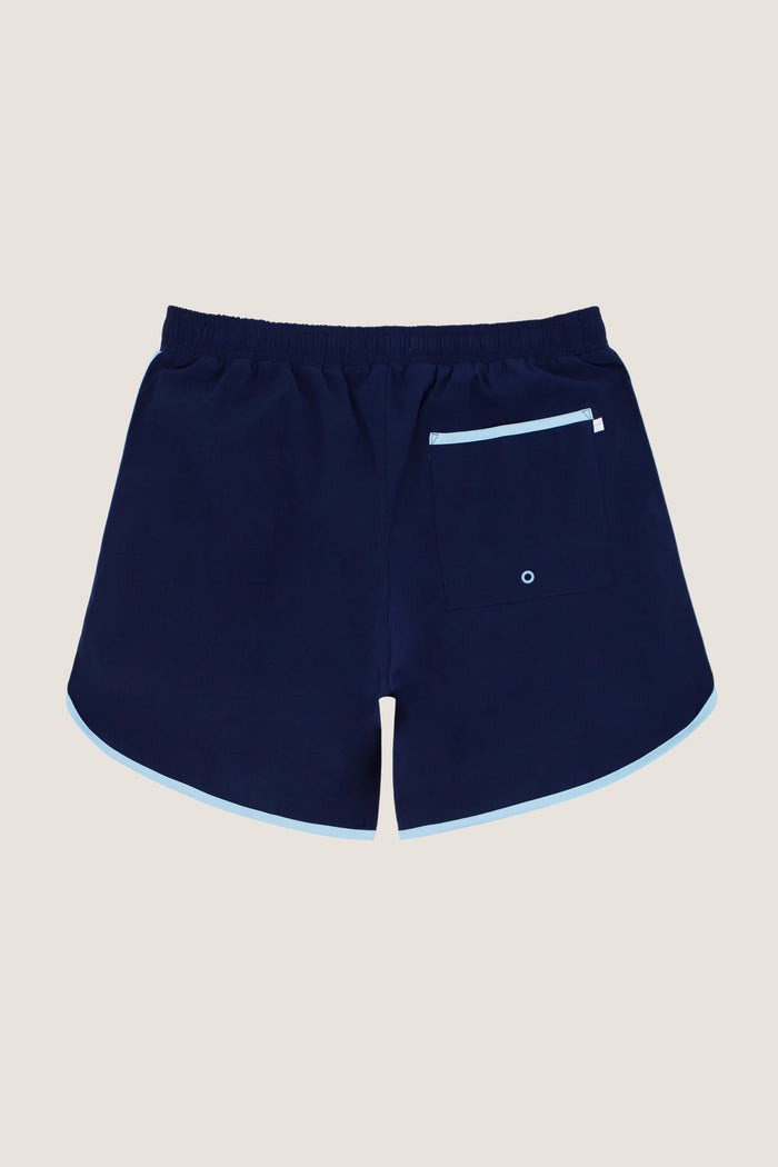 Navy Boardie swim trunks, classic and effortless, feature an elastic drawstring waist, side pockets, and a back patch pocket. High-end design for fun, all-day comfort.