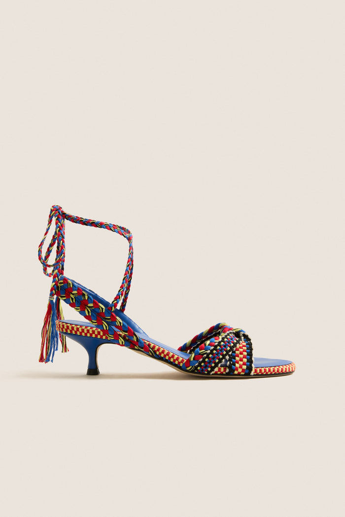 Miro Aitana Wrap Heels feature classic woven straps with a fun, effortless design and high-end tassel laces, perfect for confident, stylish adventures.