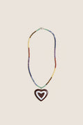 Multi Alma Necklace with rainbow acrylic beads and a dark heart pendant, offering a classic, effortless pop of color for a fun, high-end style.