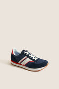 Classic Navy, Red and White Rena Sneakers featuring a navy blue mesh and suede upper, white stripes, and gum-rubber outsole, offering an effortless, high-end, and fun style.