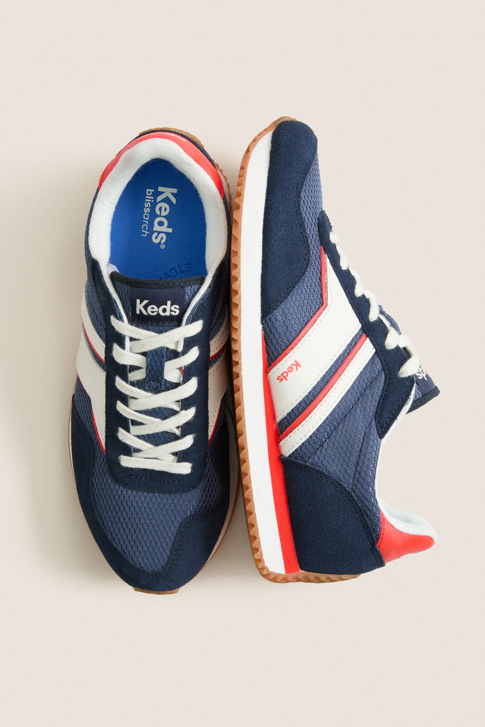 Classic Navy, Red and White Rena Sneakers with mesh panels, suede overlays, and gum-rubber outsole, offering an effortless, high-end style for fun, confident adventures.