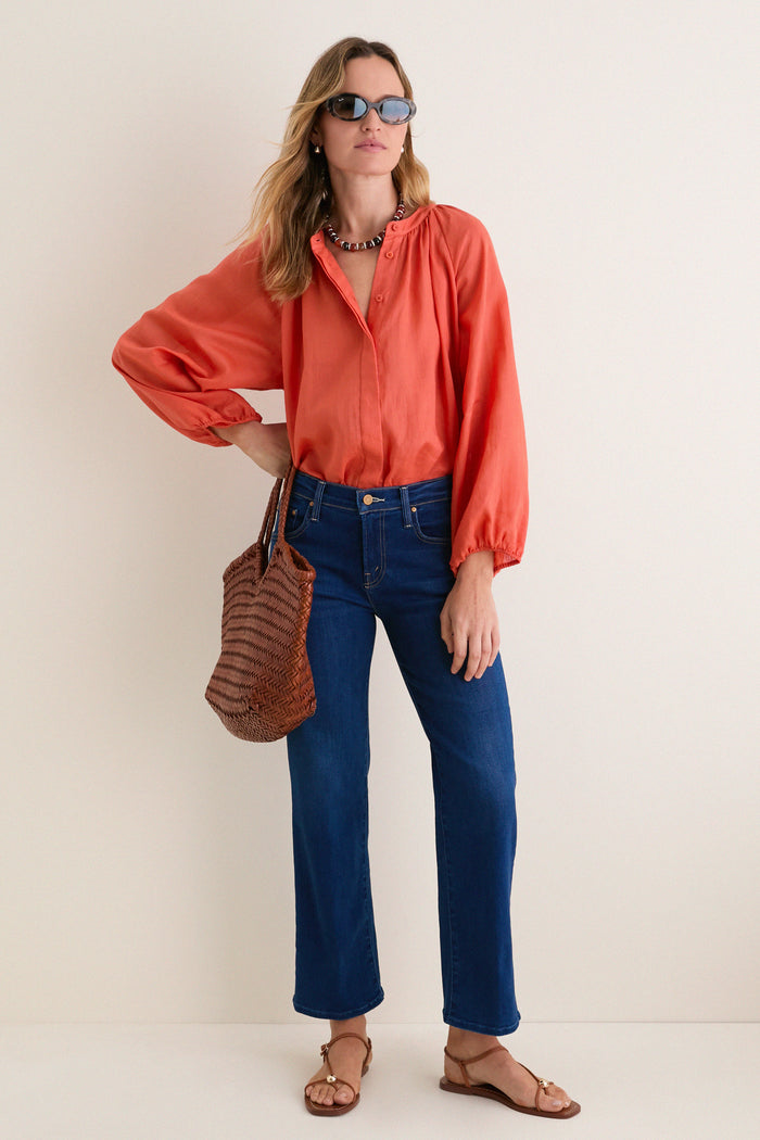 Woman wearing Opal Grey Havana RB2223 Sunglasses, exuding effortless style in a casual pose, paired with chic attire and accessories for a classic, fun, high-end look.
